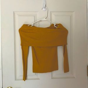 Off the shoulder shirt.